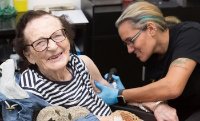 Dorothy braved the needle with a snoopy inspired tattoo
