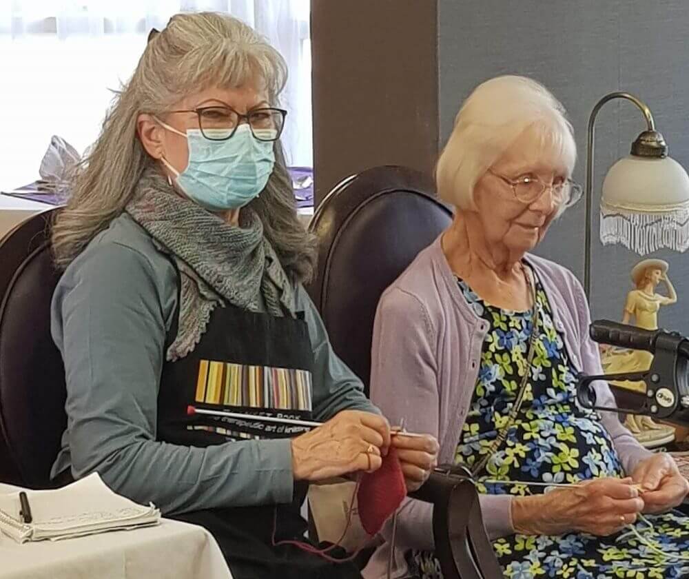 Residents at Parker Meadows have been teaching team members to knit blankets and scarves.