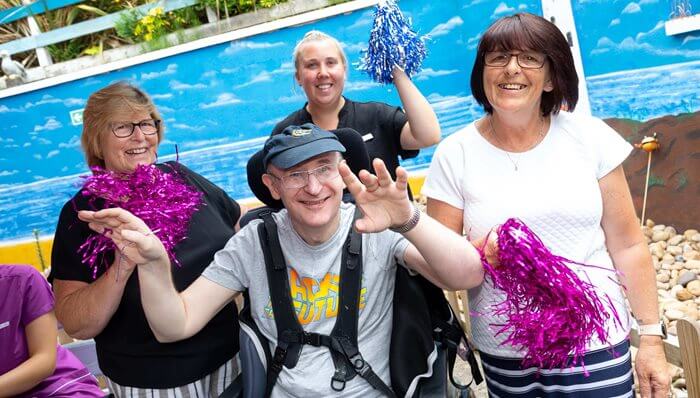 The team and residents at Brook Court enjoying the festival fun